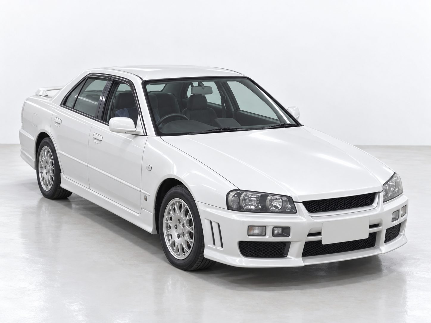 White Nissan Skyline R34 25GT FOUR ENR34 all-wheel-drive sedan